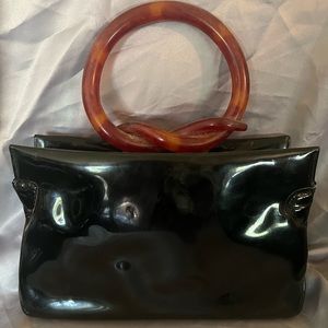 Vintage 1950’s Patent Leather handbag with ornate Bakelite handle